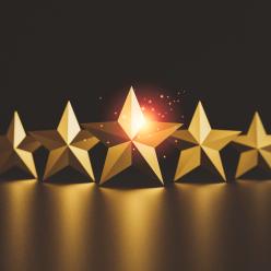 Graphic of five glowing stars