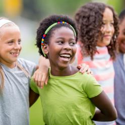 A group of young children laughing
