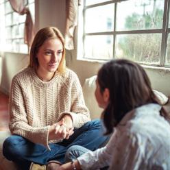 A mother talking with her child.