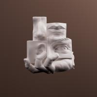 Sculpture of an eye, nose, mouth, and an ear.